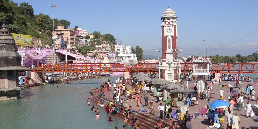 Devotees gathered by the Ganges River in Haridwar - places to visit in Uttarakhand in April