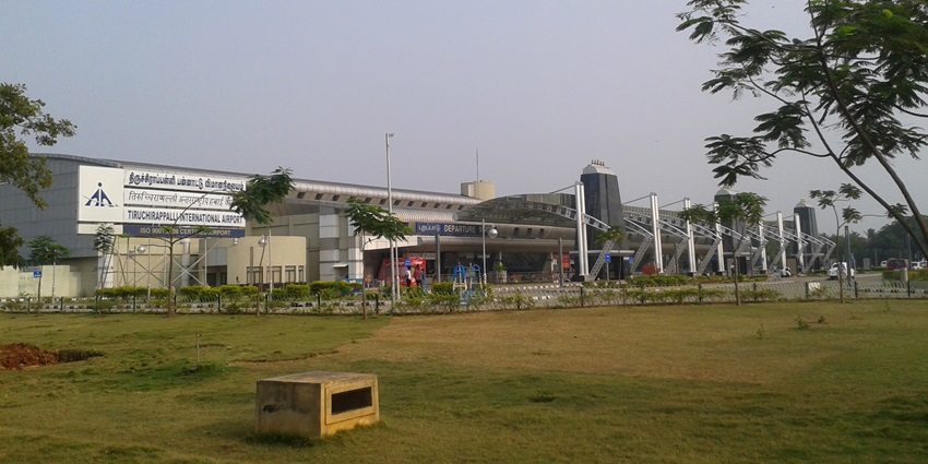 Tiruchirappalli International Airport with modern terminal, a park and airport signage