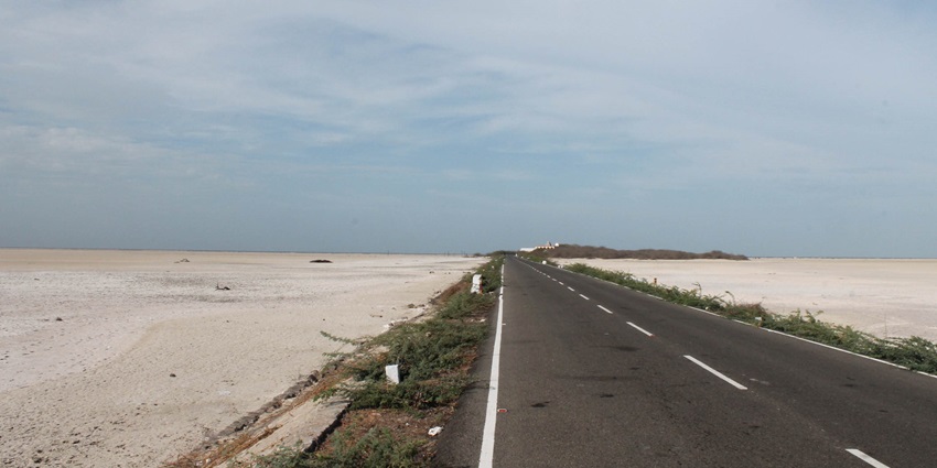 Road leading to Kothandaramaswamy Temple in Rameswaram with no vehicles passing through.