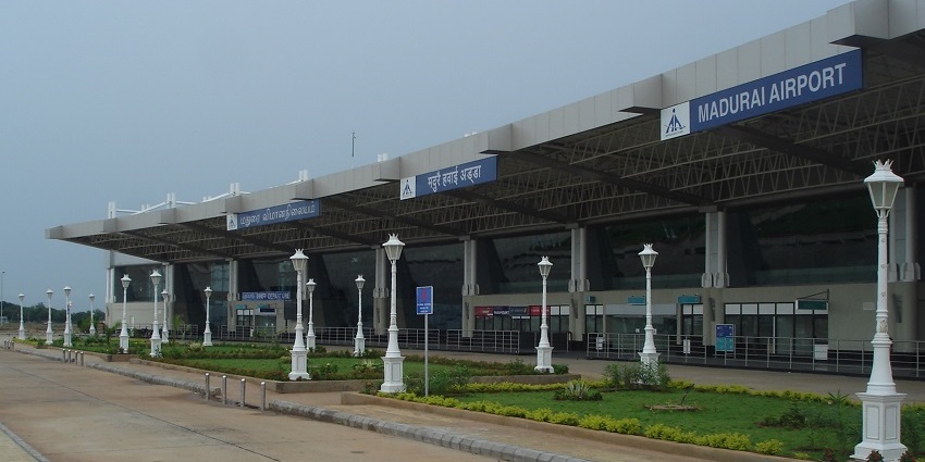 Madurai International Airport entrance has with modern design and tall white street lamps