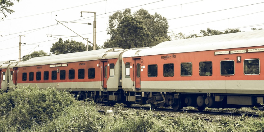 An image of a train which is a travel option to Ghorakhal Temple: air, railway, and road.