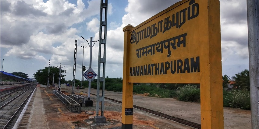 Ramanathapuram Railway Station Board with railway track in front and a clear sky