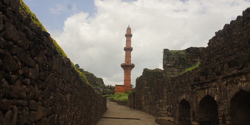 Image of the halls of the Ghangad fort covered with green moss