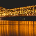 A view of the Howrah Bridge at night, one of the places to visit in Howrah