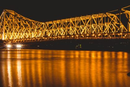 A view of the Howrah Bridge at night, one of the places to visit in Howrah