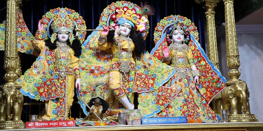 Seeking blessings from Lord Krishna and Radharani at ISKCON Temple, Uttar Pradesh.