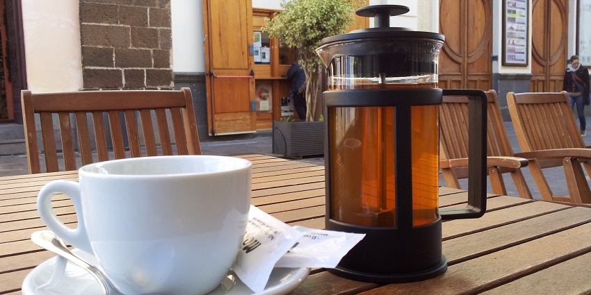 Serene tea house featuring various herbal teas and snacks.