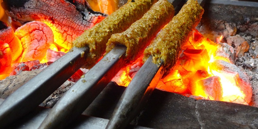 Seekh Kebabs, made of spiced meats on metal rods (seekhs) grilled on an open coal fire