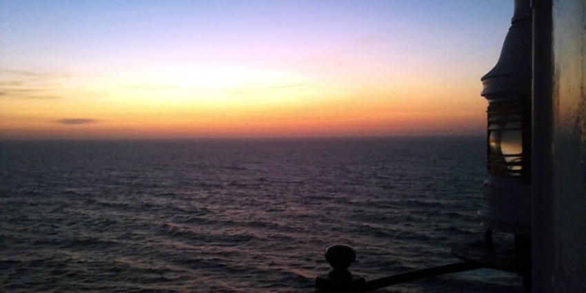A beautiful sunset view from a lighthouse, a popular destination near Jaigad Fort.