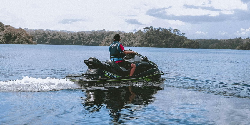 An exciting picture capturing riders enjoying jet skiing among popular water sports in Diveagar beach