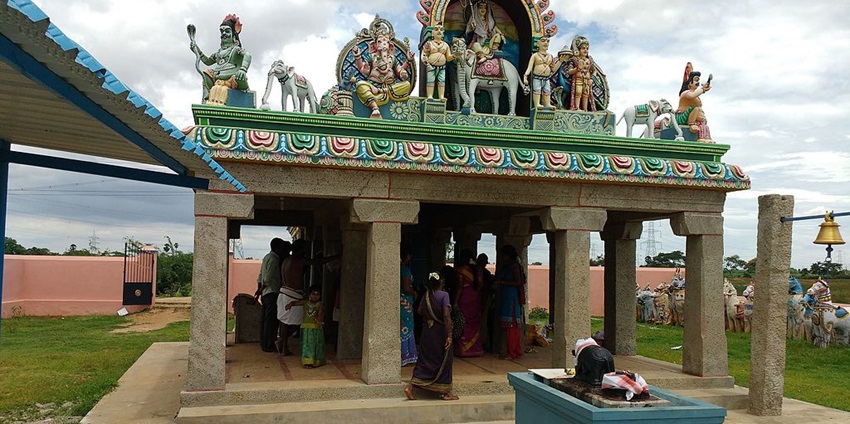 Vibrant sculptures of Ayyanar deities at Palavangudi temple of intricate craftsmanship.