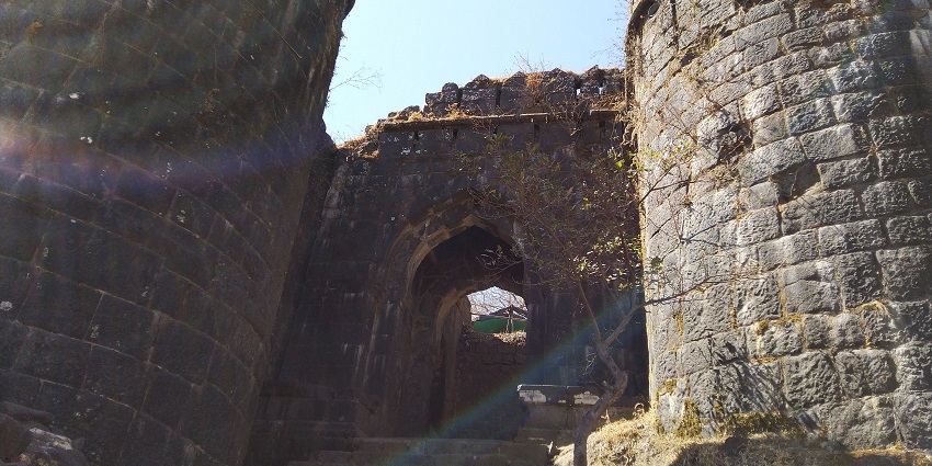 Kalyan Darwaza is an intricately carved gateway showcasing historical architectural craftsmanship.