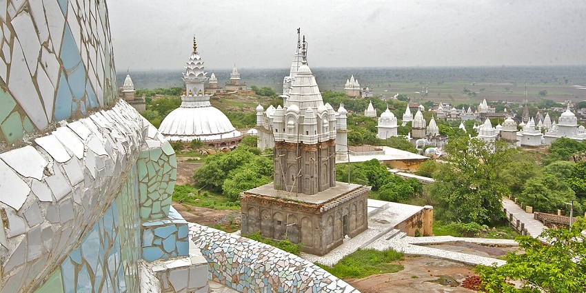 Panoramic image of the beautiful Jain temples surrounded by the lush greenery