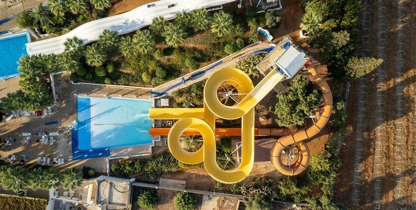 The image shows birds eye view of a waterpark, fun twisty ride - Karnal water parks