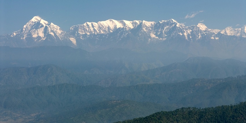 Panoramic Himalayan view of Trisul and Nanda Devi peaks from Kausani in Uttarakhand.