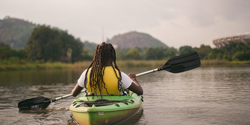 A perfect view of a person kayaking which is one of the best Nagaon Beach water sports.