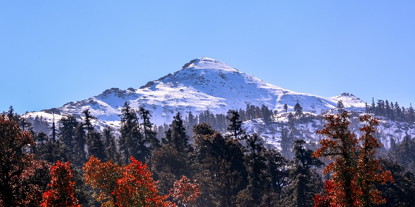 Kedarkantha Peak provides sightseeing views near Govind Wildlife Sanctuary.