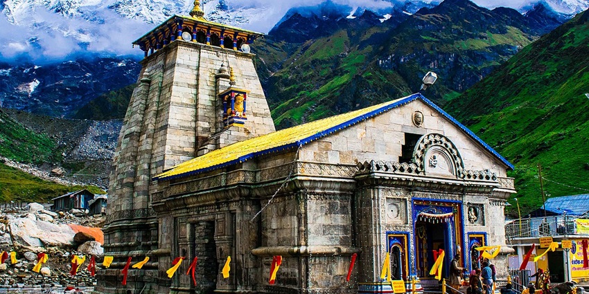 Places to visit in Rudraprayag trip include the ancient temple surrounded by mountains.