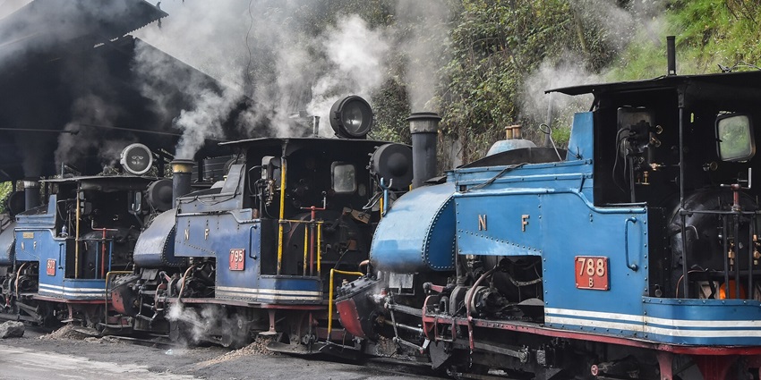 The picture of a toy train at the Darjeeling Himalayan Railway Station