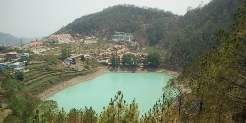 Khurpa Tal features a serene lake and tranquil surroundings, popular for trekking in Nainital.