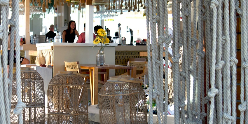 Image of tables and chair inside the Kipling Cafe creating a cosy ambience