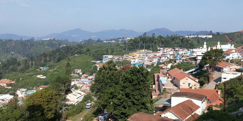 A picture of Kotagiri’s hills and green tea plantations, a charming Tamil Nadu hill station.
