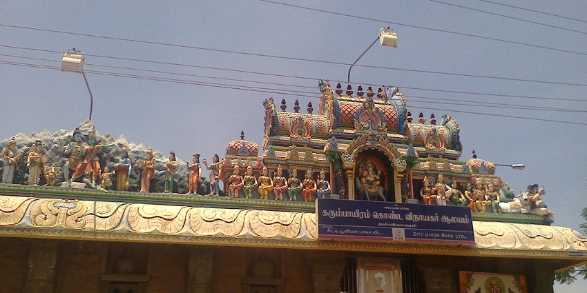 Kumbakonam Temple entrance with colourful statues and traditional architectural details.