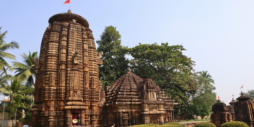 Parthsarathi Temple with its detailed architectural style and structure behind a tree