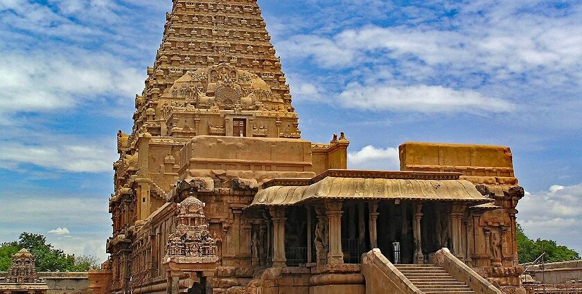 Lalithambigai Temple with a tall flagstaff in the foreground and gates with intricate details