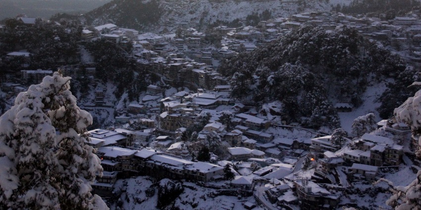 Landour during the winter season, covered with snow for travellers to explore.