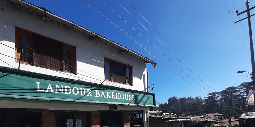 Delightful bakery at a scenic location, serving fresh pastries, bread, and coffee.