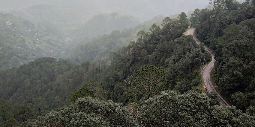 Picturesque view of Lansdowne hill station surrounded by lush green forests