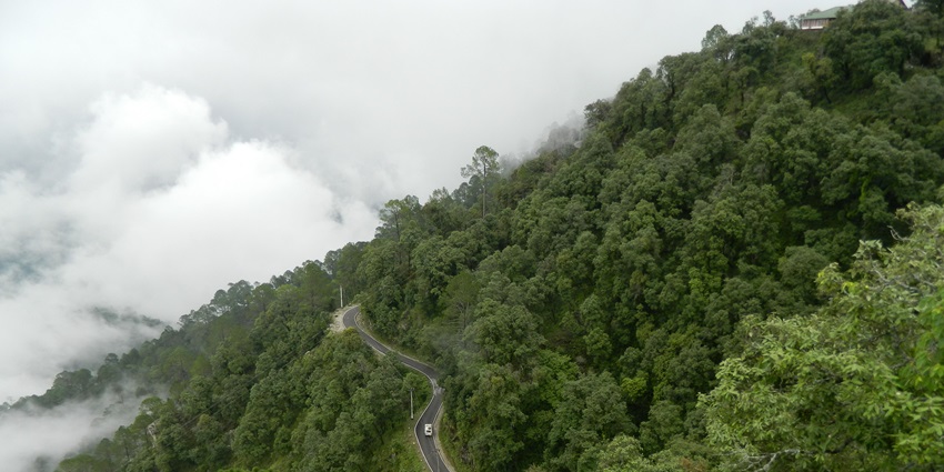 An aerial picture of the mesmerising road passing through the lush green Lansdowne hills