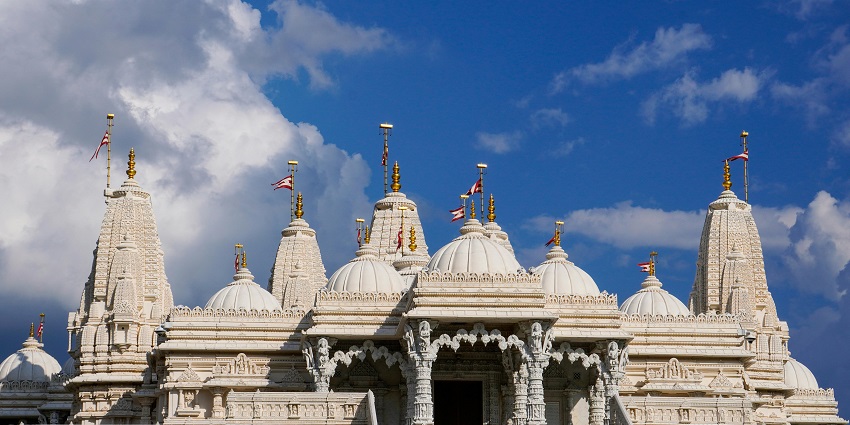 An image of Laxmi Narayan Temple in Ghaziabad which has several domes and spires.