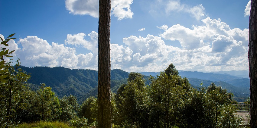 A breathtaking vista justifying the serene location of the Budher Caves, Uttarakhand.
