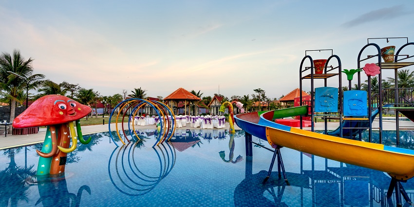 A photo of an amusement park with inflatable slides and play areas in Varanasi.