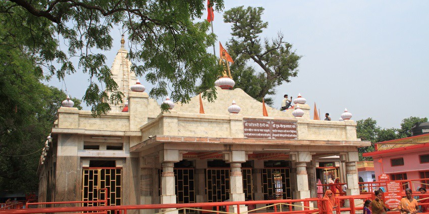 Temple building at golden hour, featuring a stunning dome and intricate architectural details