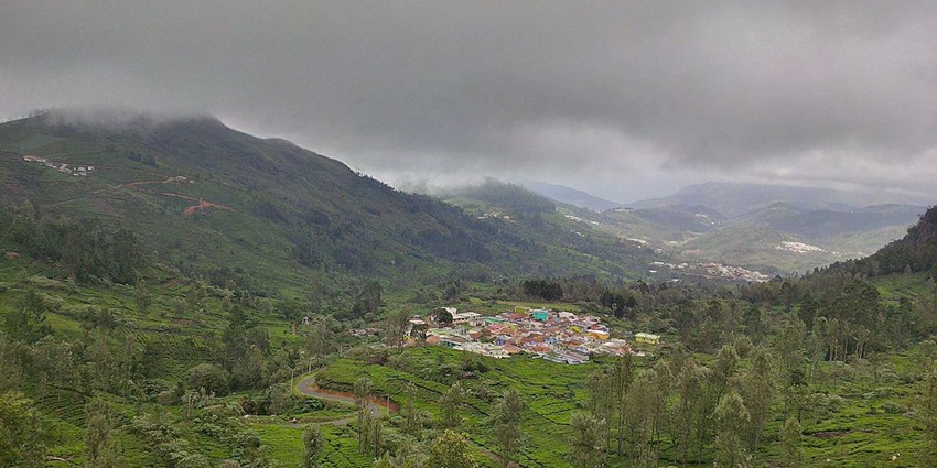View of lush green Nilgiri Hills in the district of Nilgiri in the Western Ghats with misty landscapes.