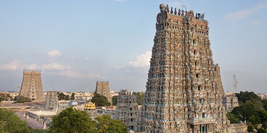 The exterior view of the Meenakshi Temple, a prominent tourist attraction in Tamil Nadu.
