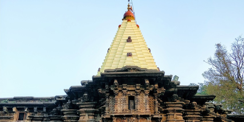 View of Mahalaxmi Mandir, an old temple made of creative work on the rocks.