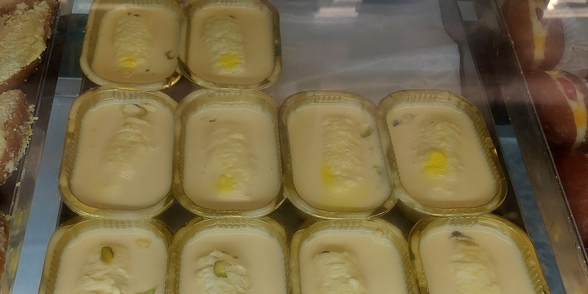 Malai rolls topped with saffron, wrapped in silver varq is a top sweet dish in Agra