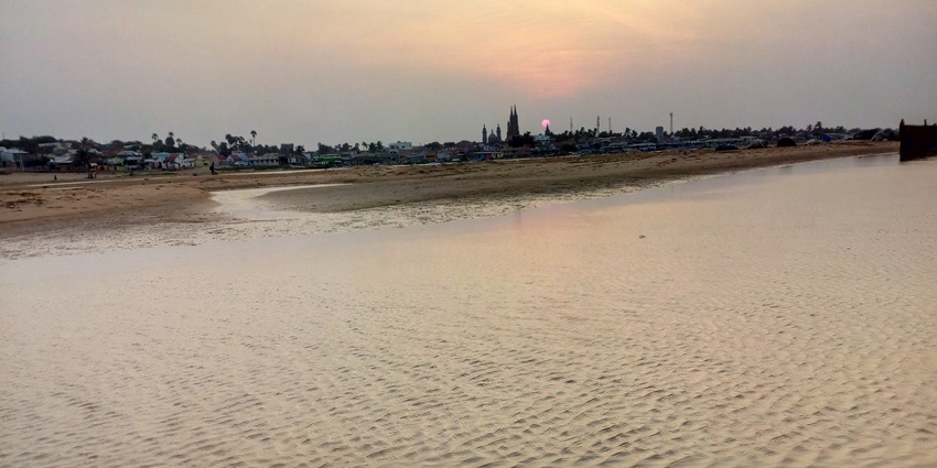 A mesmerising view of Manapad featuring pristine golden shorelines and azure waters.
