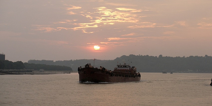 Stunning sunset over Mandovi River in Panaji, Goa, casting warm hues across the sky and water