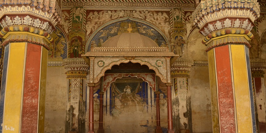 Durbar Hall of Thanjavur Maratha Palace with intricate architecture and historical decor.