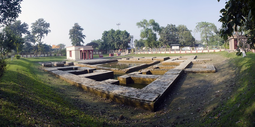 Buddha at Matha Kuar Shrine surrounded by peaceful gardens