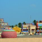 Mayuranathaswami Temple with its huge compound on a bright sunny day in Mayiladuthurai.