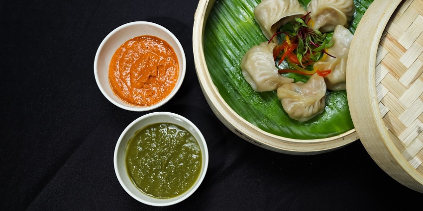 The best food in Dehradun is the steamed dumplings filled with vegetables or meat, served hot.