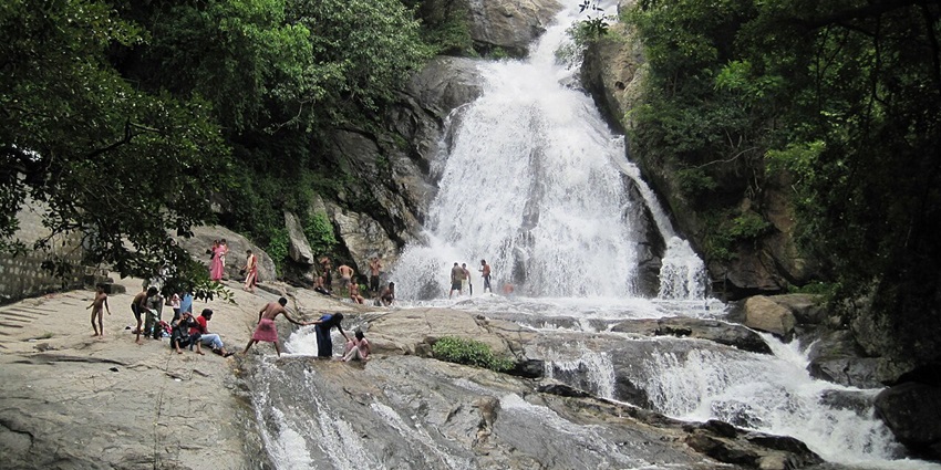 Monkey Falls, a refreshing waterfall near Indira Gandhi National Park, is ideal for a relaxing break