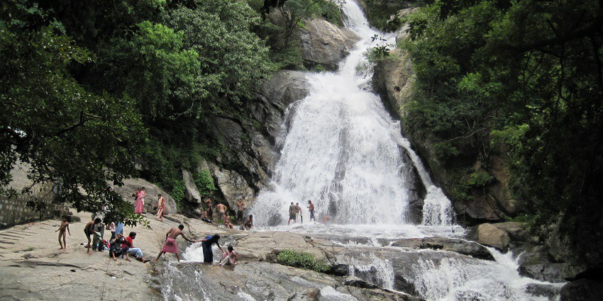 An image of Monkey Falls, the silver water cascading down the rocks
