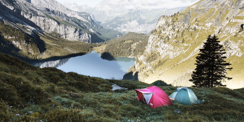 Campground with stunning mountain vistas and serene atmosphere.